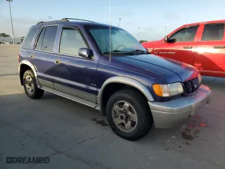 1998 Kia Sportage with VIN KNDJA7238W5579428, listed as a Copart auction lot 77242224 with 160,700 mi miles and Salvage Title. Bid and sale history available at carsss.com. Image 4.