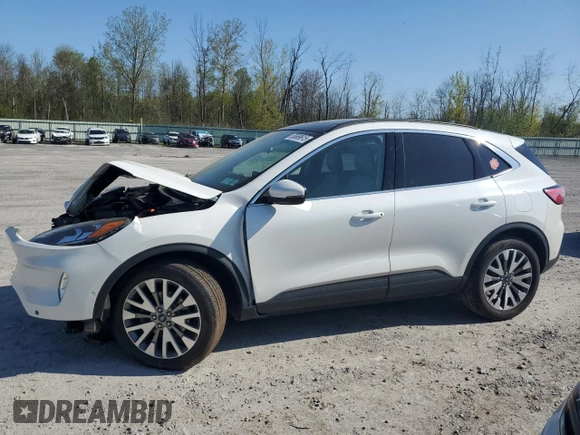 2020 Ford Escape Titanium Hybrid z VIN 1FMCU9DZ4LUC12763, wystawiony jako Copart lot #56589615 z przebiegiem Nie podano mil oraz Szkoda całkowita • Salvage title. Historia ofert i sprzedaży dostępna na DreamBid. Obrazek 1.