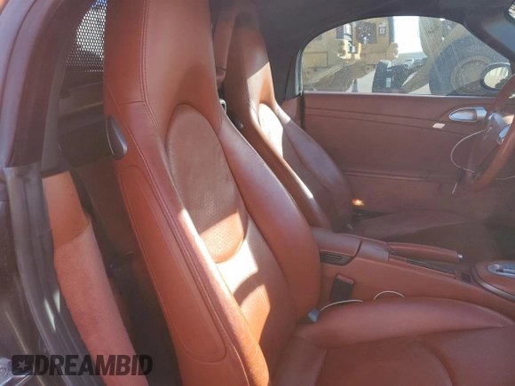 2006 Porsche Boxster с VIN WP0CA29816U710539, выставлен на аукционе Copart как лот 80785334 с пробегом 104 041 миль миль и Списание • Salvage title. История ставок и продаж доступна на DreamBid. Изображение 10.