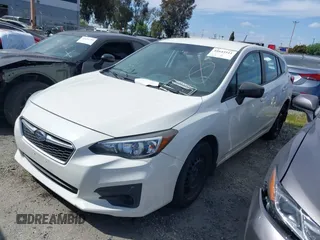 2018 Subaru Impreza with VIN 4S3GTAA6XJ3729301, listed as a IAAI auction lot 41643511 with 91,953 mi miles and . Bid and sale history available at DreamBid. Image 2.