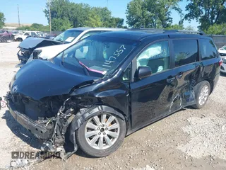 2017 Toyota Sienna XLE with VIN 5TDDZ3DC6HS147557, listed as a IAAI auction lot 39851503 with 141,719 mi miles and . Bid and sale history available at DreamBid. Image 2.