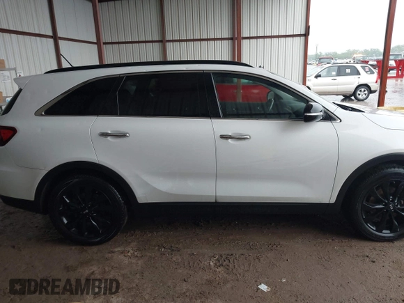 2019 Kia Sorento LX z VIN 5XYPG4A57KG609790, wystawiony jako IAAI lot #42199013 z przebiegiem 83 091 mil mil oraz . Historia ofert i sprzedaży dostępna na DreamBid. Obrazek 13.