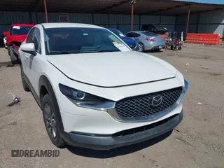 2021 Mazda CX-30 S with VIN 3MVDMAAL1MM214954, listed as a IAAI auction lot 42184140 with 52,350 mi miles and . Bid and sale history available at DreamBid. Image 1.