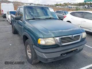 1999 Mazda B-Series Truck SE with VIN 4F4ZR17X1XTM03734, listed as a IAAI auction lot 41572741 with 304,414 mi miles and . Bid and sale history available at DreamBid. Image 1.