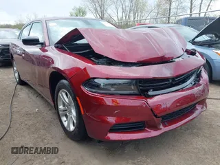 2023 Dodge Charger SXT with VIN 2C3CDXBG9PH659726, listed as a IAAI auction lot 42103636 with 14,321 mi miles and . Bid and sale history available at DreamBid. Image 1.