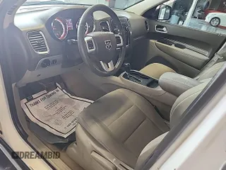 2013 Dodge Durango SXT with VIN 1C4RDJAG8DC671689, listed as a IAAI auction lot 42743958 with 160,950 mi miles and . Bid and sale history available at DreamBid. Image 4.