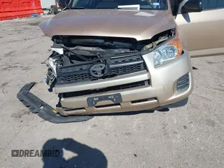 2009 Toyota RAV4 with VIN JTMZF33V995000660, listed as a IAAI auction lot 41633209 with 106,959 mi miles. Bid and sale history available at carsss.com. Image 6.