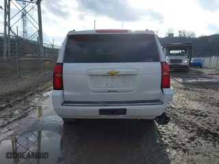 2017 Chevrolet Suburban Premier with VIN 1GNSKJKC9HR406373, listed as a IAAI auction lot 41695349 with 99,863 mi miles. Bid and sale history available at carsss.com. Image 17.