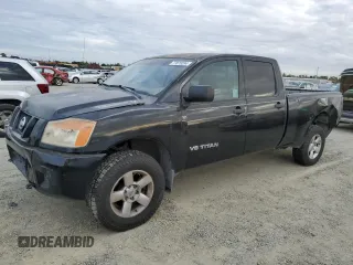 2008 Nissan Titan z VIN 1N6BA07F88N309789, wystawiony jako Copart lot #77879284 z przebiegiem 213 835 mil mil oraz Szkody całkowita. Historia ofert i sprzedaży dostępna na DreamBid. Obrazek 1.