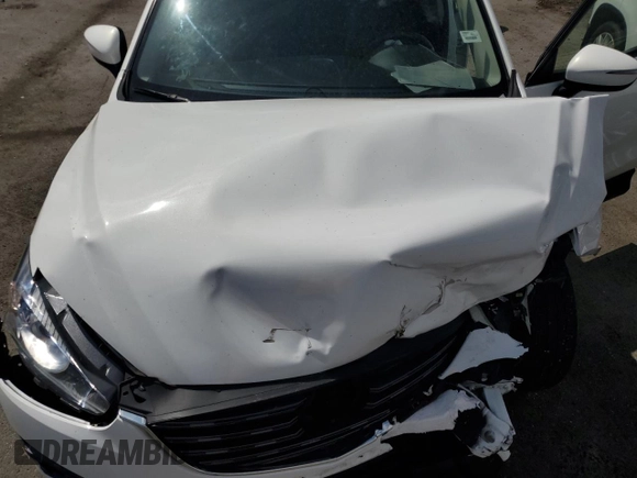 2016 Mazda CX-5 Grand Touring z VIN JM3KE2DY9G0645141, wystawiony jako Copart lot #50989635 z przebiegiem 123 898 mil mil oraz Szkoda całkowita • Salvage title. Historia ofert i sprzedaży dostępna na DreamBid. Obrazek 12.