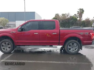 2015 Ford F-150 XLT with VIN 1FTEW1E89FFB76849, listed as a IAAI auction lot 41936016 with 107,773 mi miles and . Bid and sale history available at carsss.com. Image 15.