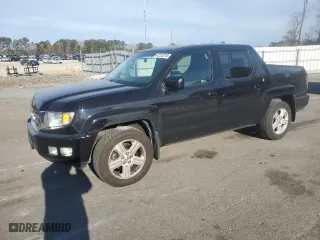 2010 Honda Ridgeline RTL with VIN 5FPYK1F53AB010683, listed as a Copart auction lot 42222215 with 136,816 mi miles and Salvage Title. Bid and sale history available at carsss.com. Image 1.