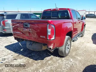 2019 GMC Canyon 4WD All Terrain w/Cloth with VIN 1GTG6FEN7K1343499, listed as a IAAI auction lot 41695869 with 163,702 mi miles. Bid and sale history available at carsss.com. Image 4.