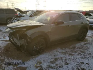 2024 Mazda CX-30 2.5 Carbon Turbo with VIN 3MVDMBXY4RM707415, listed as a Copart auction lot 88010135 with 796 mi miles and Salvage Title. Bid and sale history available at carsss.com. Image 1.