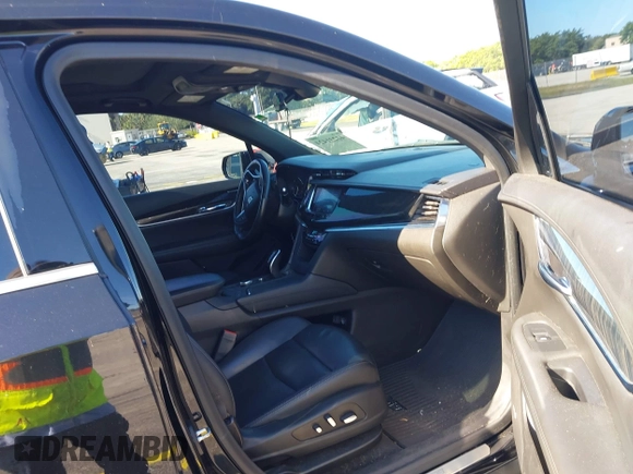 2020 Cadillac XT6 FWD Premium Luxury with VIN 1GYKPCRS7LZ211197, listed as a IAAI auction lot 42231424 with 57,351 mi miles and . Bid and sale history available at DreamBid. Image 5.