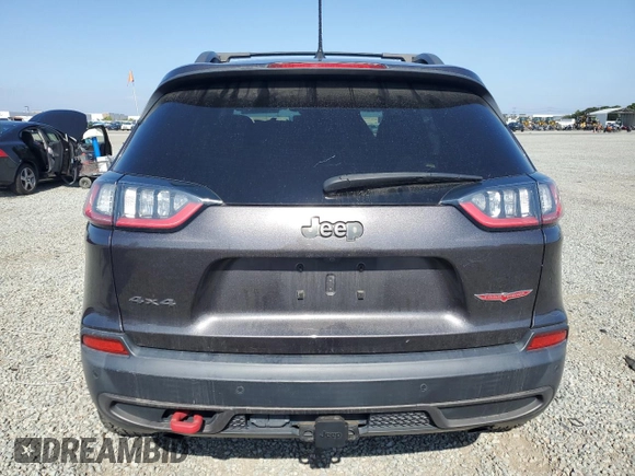 2019 Jeep Cherokee Trailhawk Elite z VIN 1C4PJMBN0KD427007, wystawiony jako Copart lot #57429735 z przebiegiem 54 070 mil mil oraz Szkoda całkowita • Salvage title. Historia ofert i sprzedaży dostępna na DreamBid. Obrazek 6.