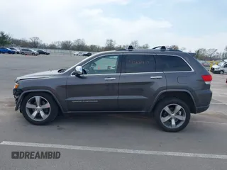 2014 Jeep Grand Cherokee Overland with VIN 1C4RJFCT6EC187098, listed as a IAAI auction lot 42077453 with 172,220 mi miles and . Bid and sale history available at DreamBid. Image 15.