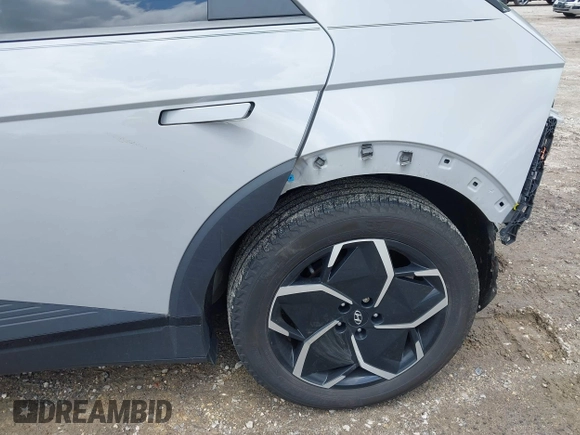 2022 Hyundai Ioniq 5 SEL z VIN KM8KNDAF0NU055189, wystawiony jako IAAI lot #42390538 z przebiegiem 37 542 mil mil oraz . Historia ofert i sprzedaży dostępna na DreamBid. Obrazek 23.