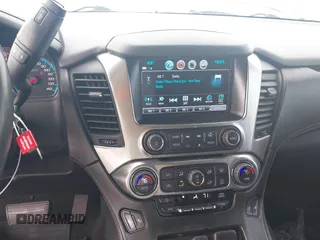 2017 Chevrolet Tahoe LT with VIN 1GNSKBKCXHR350028, listed as a IAAI auction lot 41684954 with 117,261 mi miles and . Bid and sale history available at DreamBid. Image 21.