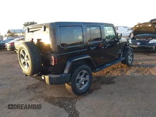 2018 Jeep Wrangler JK Unlimited Sahara with VIN 1C4HJWEG0JL810480, listed as a IAAI auction lot 41260609 with 69,776 mi miles. Bid and sale history available at carsss.com. Image 4.