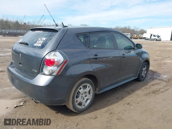 2009 Pontiac Vibe w/1SB with VIN 5Y2SP67099Z425237, listed as a IAAI auction lot 41597510 with 158,698 mi miles. Bid and sale history available at carsss.com. Image 4.