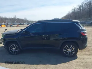 2018 Jeep Compass Altitude with VIN 3C4NJDBB2JT418914, listed as a IAAI auction lot 41759891 with 137,643 mi miles and . Bid and sale history available at carsss.com. Image 14.