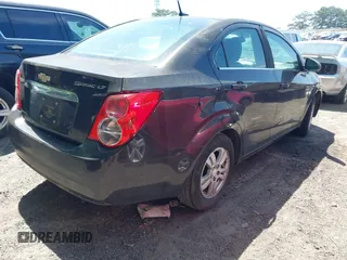 2013 Chevrolet Sonic LT with VIN 1G1JC5SH6D4201811, listed as a IAAI auction lot 42082122 with 212,944 mi miles and . Bid and sale history available at DreamBid. Image 4.