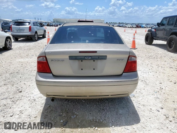 2006 Ford Focus S with VIN 1FAFP34N26W225772, listed as a Copart auction lot 62657045 with 117,078 mi miles and Salvage title. Bid and sale history available at DreamBid. Image 6.