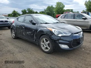 2013 Hyundai Veloster w/Gray Int z VIN KMHTC6AD9DU110094, wystawiony jako Copart lot #64660645 z przebiegiem 149 746 mil mil oraz Szkoda całkowita • Salvage title. Historia ofert i sprzedaży dostępna na DreamBid. Obrazek 4.