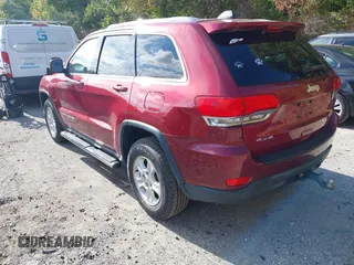2014 Jeep Grand Cherokee Altitude with VIN 1C4RJFAG3EC477952, listed as a IAAI auction lot 40446154 with 35,573 mi miles. Bid and sale history available at carsss.com. Image 3.