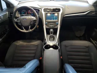 2015 Ford Fusion SE z VIN 3FA6P0H96FR104855, wystawiony jako Copart lot #51948365 z przebiegiem 84 281 mil mil oraz Szkoda całkowita • Salvage title. Historia ofert i sprzedaży dostępna na DreamBid. Obrazek 8.