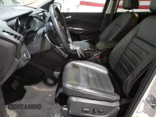 2016 Ford Escape Titanium with VIN 1FMCU9J93GUB78230, listed as a Copart auction lot 51661025 with 98,515 mi miles and Salvage Title. Bid and sale history available at DreamBid. Image 7.