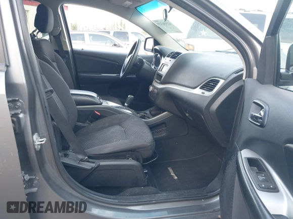 2012 Dodge Journey SXT with VIN 3C4PDDBG2CT333537, listed as a IAAI auction lot 42556329 with 172,834 mi miles and . Bid and sale history available at DreamBid. Image 5.