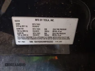 2024 Tesla Model Y with VIN 7SAYGDED9RF053203, listed as a IAAI auction lot 41906729 with Not Provided miles and . Bid and sale history available at DreamBid. Image 9.