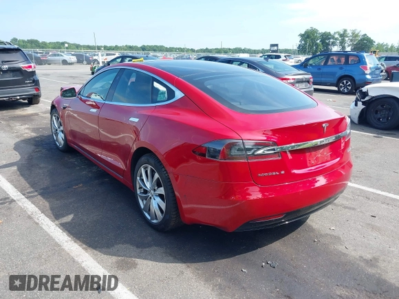 2016 Tesla Model S 90D z VIN 5YJSA1E4XGF171244, wystawiony jako IAAI lot #42584589 z przebiegiem 85 412 mil mil oraz . Historia ofert i sprzedaży dostępna na DreamBid. Obrazek 3.