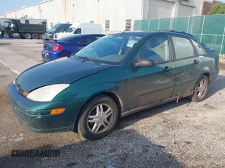 2000 Ford Focus SE with VIN 1FAFP3431YW273376, listed as a IAAI auction lot 39471057 with 214,968 mi miles and . Bid and sale history available at carsss.com. Image 2.