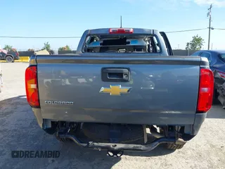 2018 Chevrolet Colorado 2WD Work Truck with VIN 1GCGSBEAXJ1199141, listed as a IAAI auction lot 42322849 with 77,811 mi miles and . Bid and sale history available at DreamBid. Image 17.
