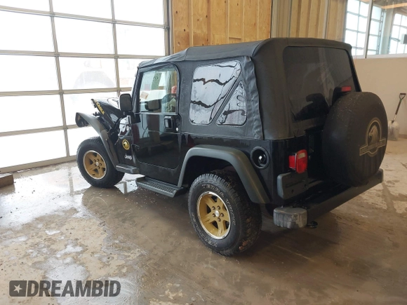 2006 Jeep Wrangler Sport with VIN 1J4FA49S96P733712, listed as a IAAI auction lot 41572913 with 93,511 mi miles. Bid and sale history available at carsss.com. Image 3.
