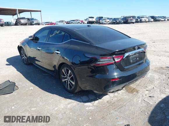2019 Nissan Maxima Platinum z VIN 1N4AA6AV0KC365901, wystawiony jako IAAI lot #41473793 z przebiegiem 137 772 mil mil oraz . Historia ofert i sprzedaży dostępna na DreamBid. Obrazek 3.