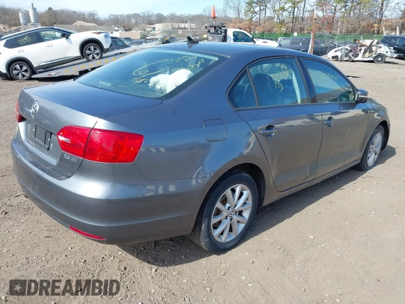 2011 Volkswagen Jetta Sedan SE w/Convenience & Sunroof PZEV with VIN 3VWDZ7AJ1BM379918, listed as a IAAI auction lot 41788875 with 999,999 mi miles. Bid and sale history available at carsss.com. Image 4.