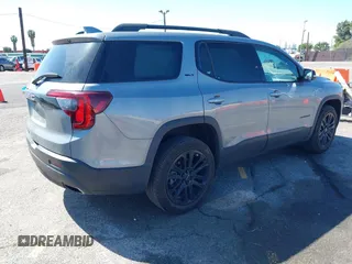 2023 GMC Acadia SLT with VIN 1GKKNML40PZ119581, listed as a IAAI auction lot 41841288 with 23,611 mi miles and . Bid and sale history available at DreamBid. Image 4.