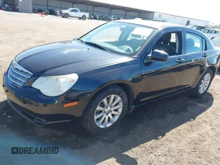 2010 Chrysler Sebring Limited with VIN 1C3CC5FB8AN140459, listed as a IAAI auction lot 41657740 with 199,682 mi miles and . Bid and sale history available at DreamBid. Image 2.