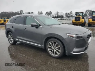 2017 Mazda CX-9 Grand Touring with VIN JM3TCADY9H0135314, listed as a Copart auction lot 45103505 with 133,185 mi miles and Salvage title. Bid and sale history available at DreamBid. Image 4.