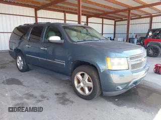 2009 Chevrolet Suburban LTZ with VIN 1GNFC36J29R293712, listed as a IAAI auction lot 42577800 with 202,593 mi miles and . Bid and sale history available at DreamBid. Image 1.