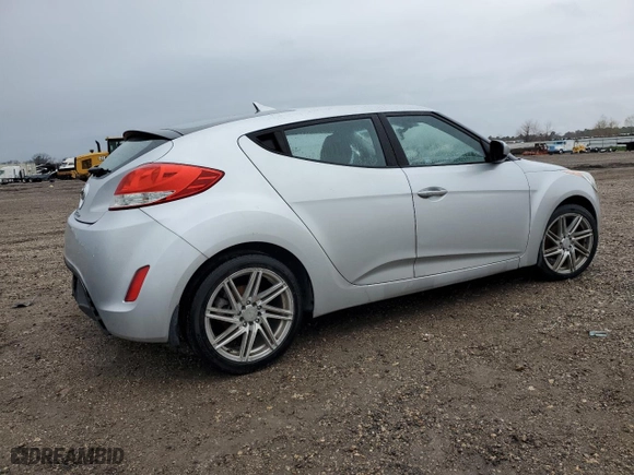 2013 Hyundai Veloster w/Black Int with VIN KMHTC6AD0DU096148, listed as a Copart auction lot 46505715 with 105,168 mi miles and Salvage Title. Bid and sale history available at carsss.com. Image 3.