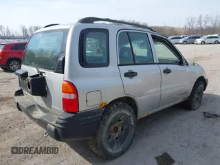 2002 Chevrolet Tracker with VIN 2CNBJ13C126940105, listed as a IAAI auction lot 41805424 with Not provided miles and . Bid and sale history available at DreamBid. Image 4.