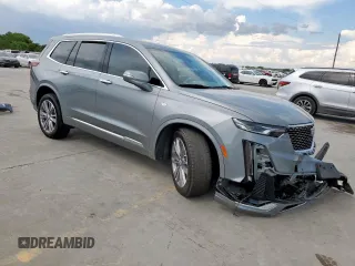 2024 Cadillac XT6 FWD Premium Luxury with VIN 1GYKPCRS7RZ704046, listed as a Copart auction lot 62534055 with 25,644 mi miles and Salvage title. Bid and sale history available at DreamBid. Image 4.