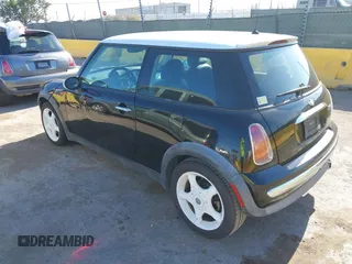 2002 MINI Hardtop with VIN WMWRC33402TC32985, listed as a IAAI auction lot 42608636 with 159,996 mi miles and . Bid and sale history available at DreamBid. Image 3.