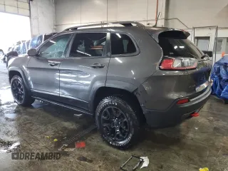 2019 Jeep Cherokee Trailhawk Elite with VIN 1C4PJMBX2KD112355, listed as a Copart auction lot 88948135 with 130,136 mi miles and Salvage Title. Bid and sale history available at carsss.com. Image 2.