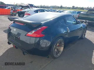 2013 Nissan 370Z with VIN JN1AZ4EH1DM880739, listed as a IAAI auction lot 40474120 with 76,369 mi miles. Bid and sale history available at carsss.com. Image 4.